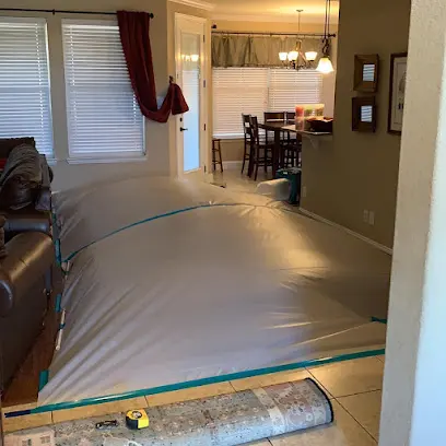 Drying equipment set in a room with the baseboards removed